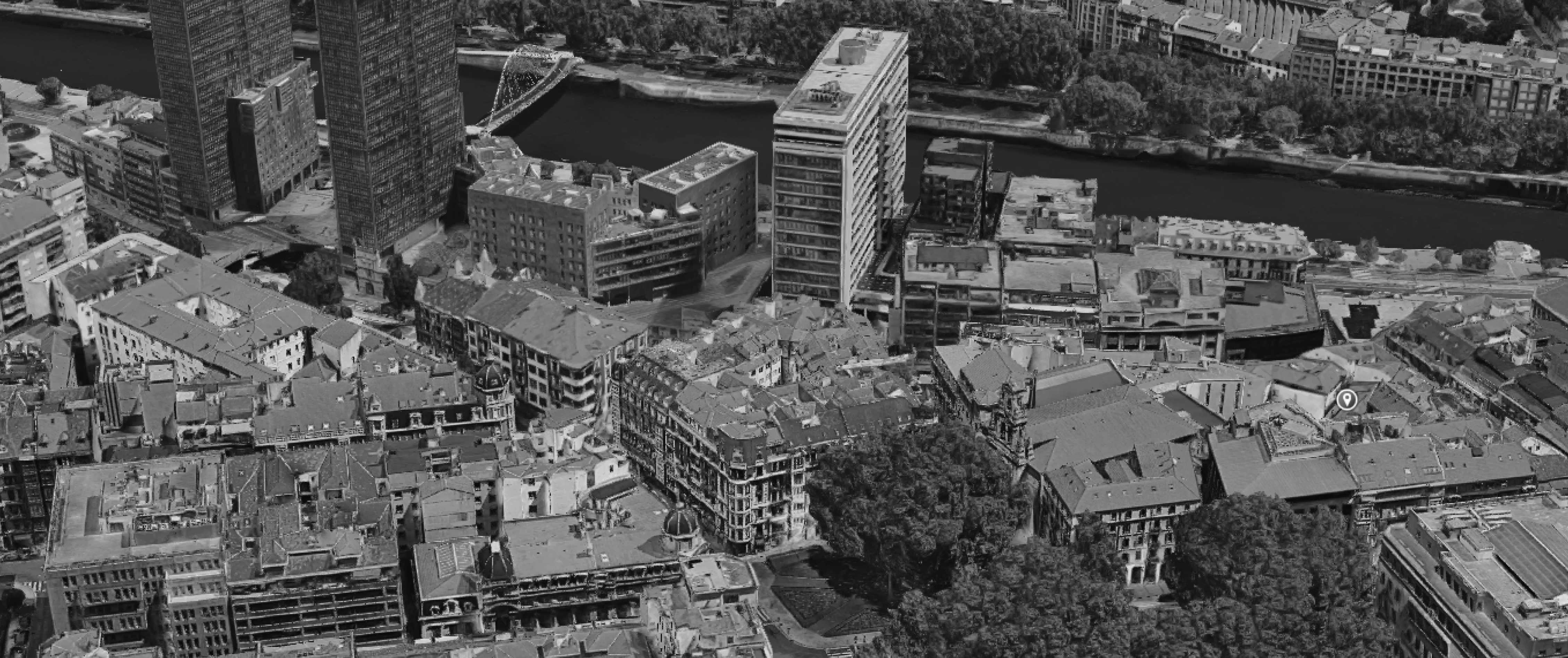Contact Worköholics buildings from above Bilbao black and white